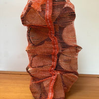 Net bag of kiln dried firewood