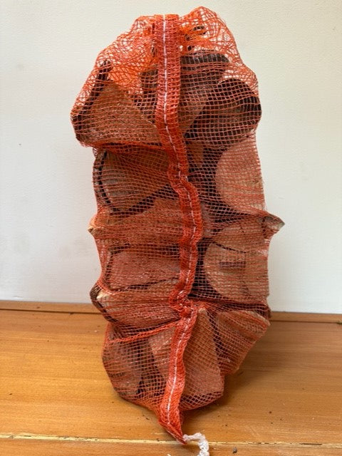 Net bag of kiln dried firewood